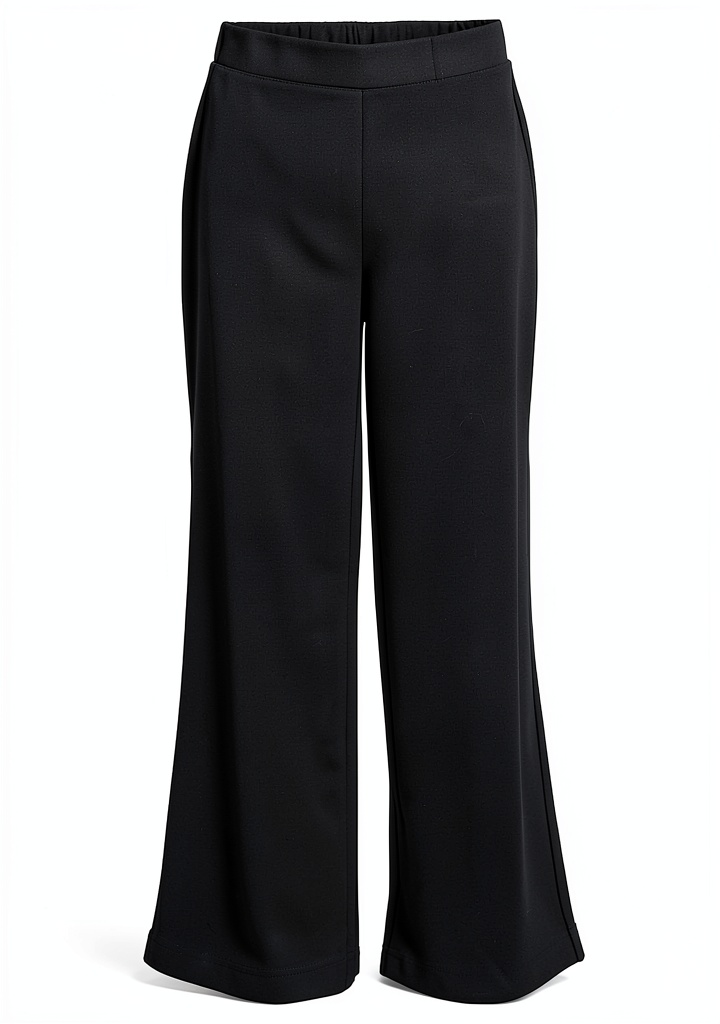 Pantalon femme Bestseller tissu doux jambes larges taille porté sur une femme assise à un bureau moderne